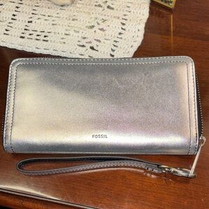 Fossil Women's Logan RFID Zip Around Clutch wallet in silver metallic leather